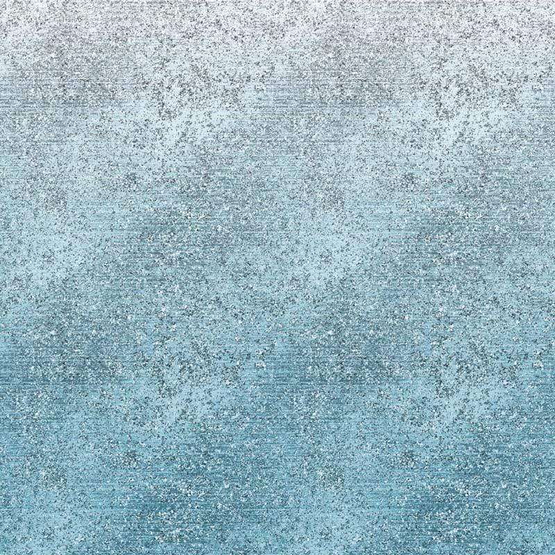Abstract blue speckled pattern fading into white