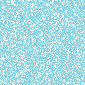 Intricate white floral pattern on a blue background