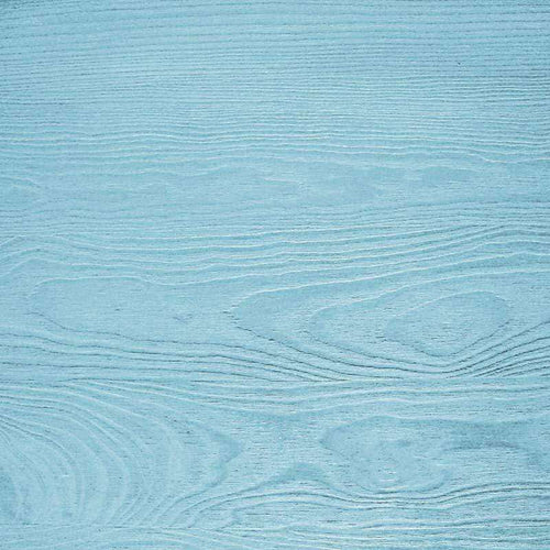 Soft cyan wooden texture with swirling patterns
