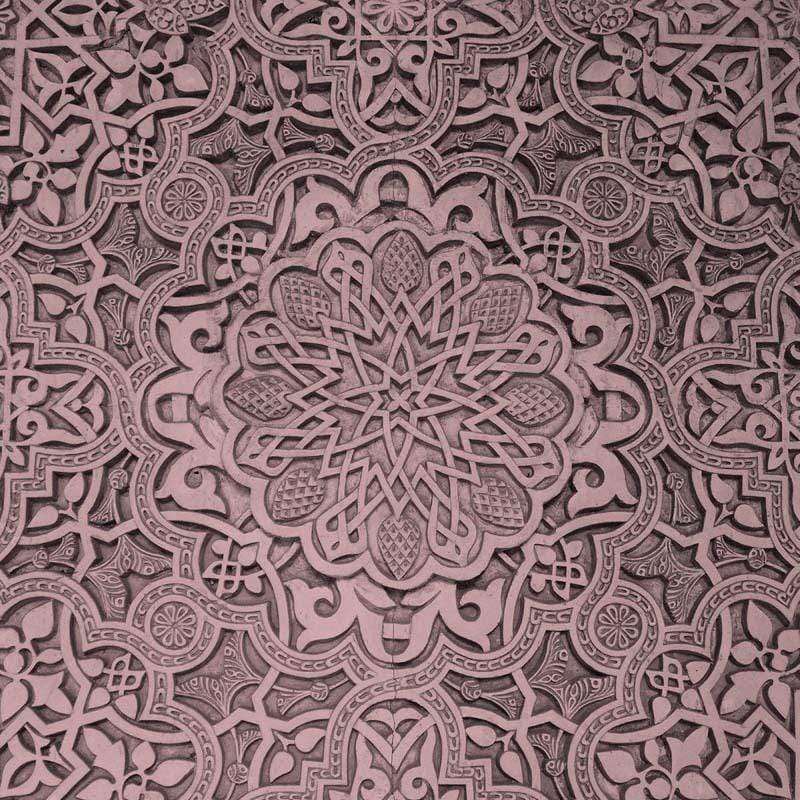 Intricate mandala pattern in shades of pink and grey