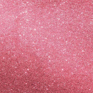 Pink glittery textured surface with shimmering highlights.