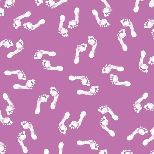 Playful array of white footprints on a purple background