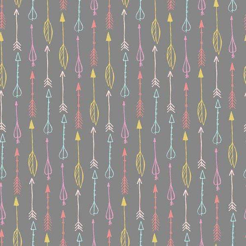 Assorted bohemian arrow patterns on a grey background