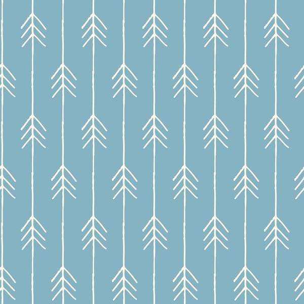 Simplistic white tree patterns on a muted blue background