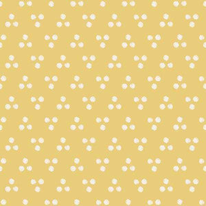 Yellow background with small white paw prints pattern