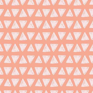 Geometric triangle pattern on a blush pink background