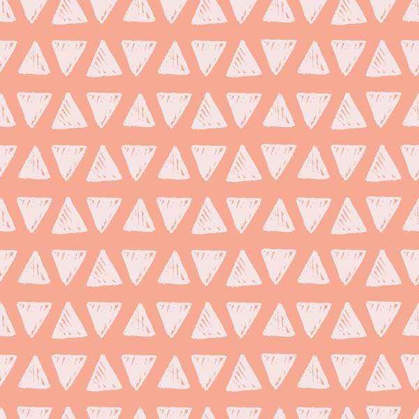 Geometric triangle pattern on a blush pink background