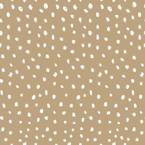 Abstract pattern of white irregular dots on a tan background