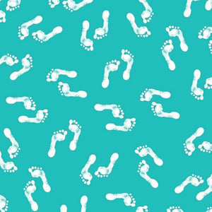 White baby footprints on a turquoise background