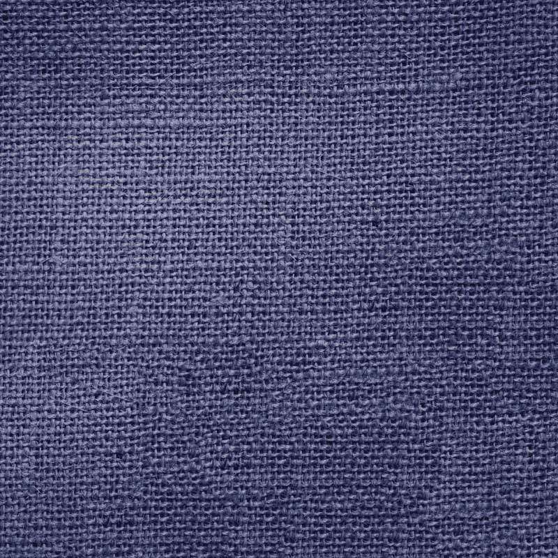 Close-up of a textured deep blue woven fabric pattern