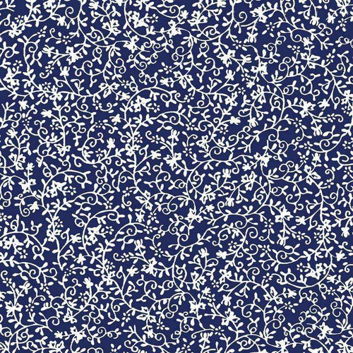 Intricate white floral patterns on a deep blue background