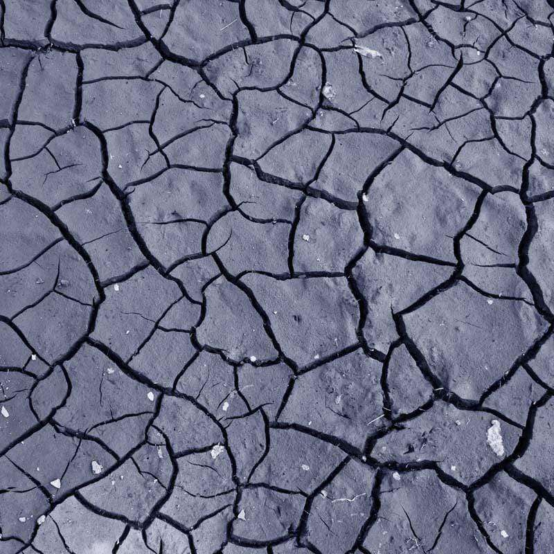 Abstract cracked clay surface pattern