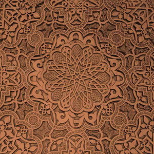 Intricate mandala pattern on a terracotta background