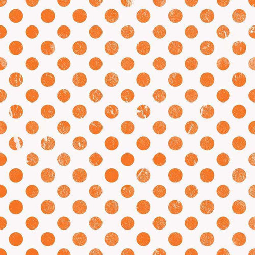 Seamless pattern of textured orange dots on a white background