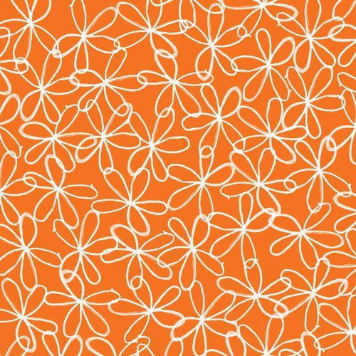 Intricate white floral pattern on a warm orange background.