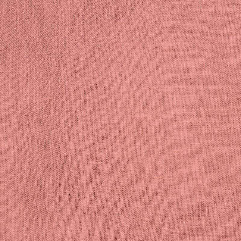 Close-up of blush pink woven fabric texture