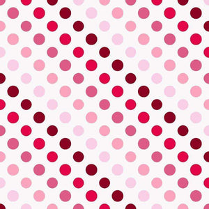 Assorted pink polka dots on white background