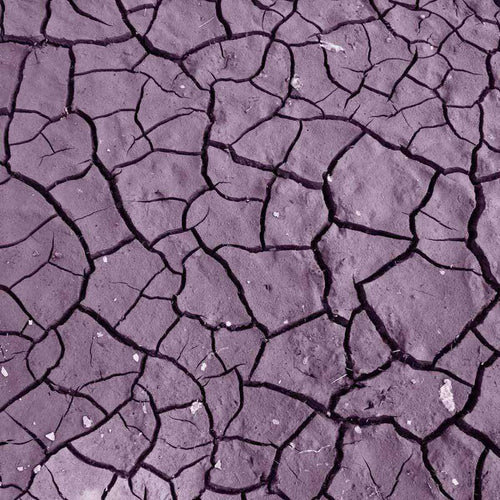 Abstract cracked surface pattern in shades of purple