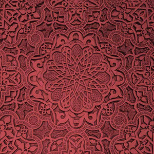 Intricate mandala pattern in shades of crimson