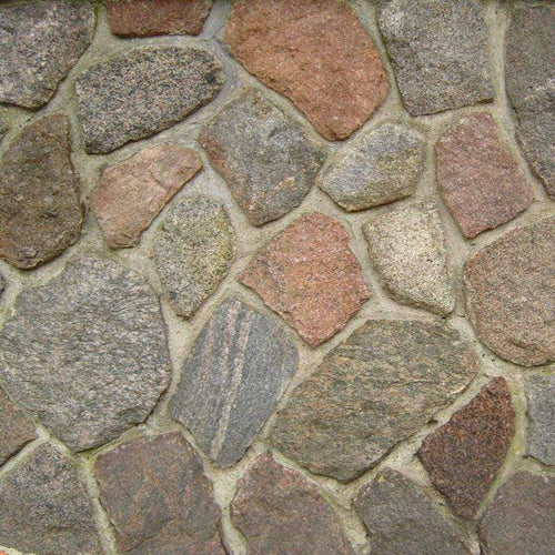 Pattern of irregular cobblestones with mortar