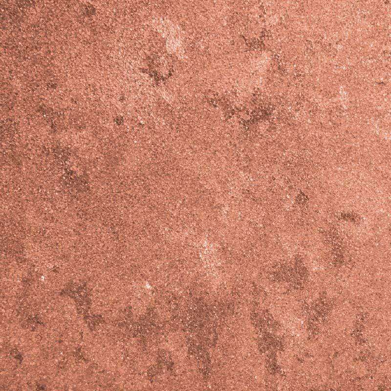 A textured terracotta pattern with subtle speckles