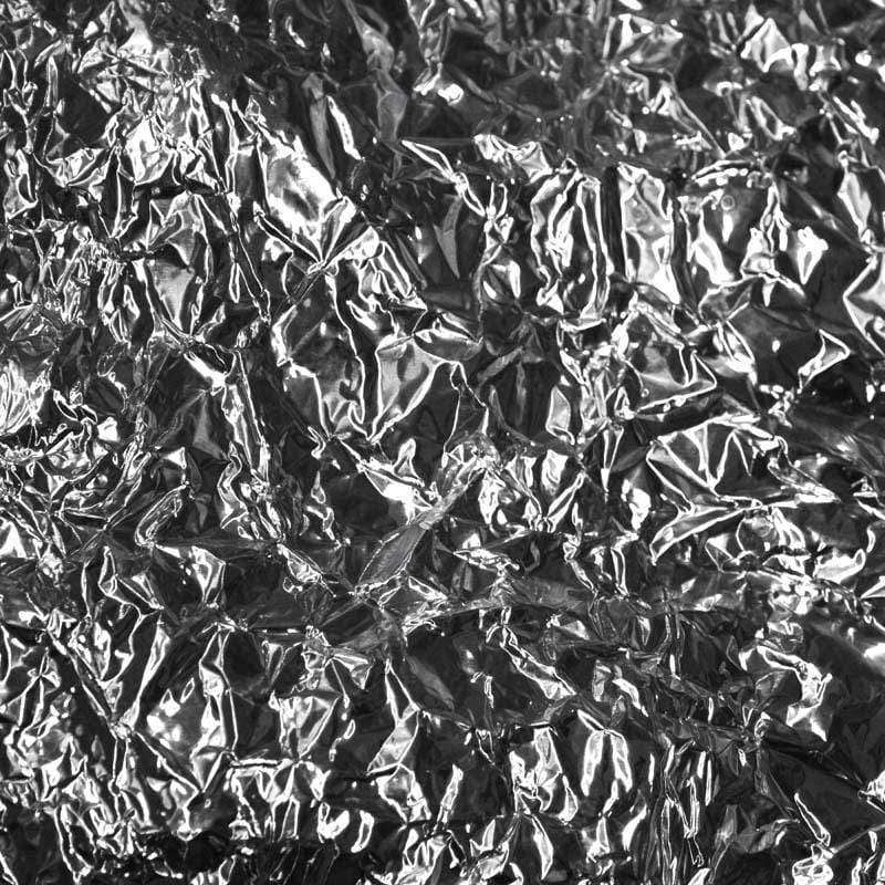 Textured crumpled foil pattern in black and white