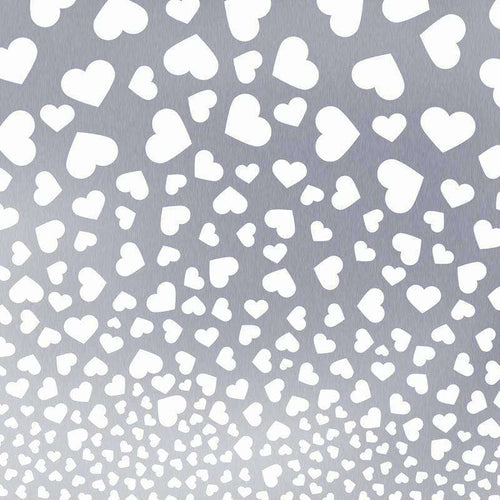 An array of white hearts on a gradient grey background