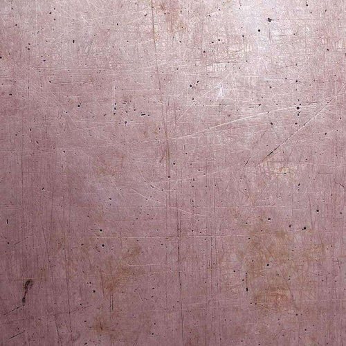 Textured aged pink wooden surface with scratches