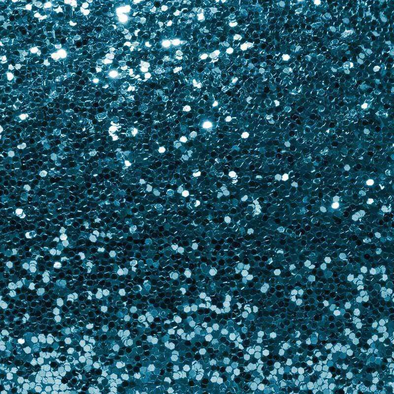 Close-up of a glistening sequin pattern with teal and silver shades