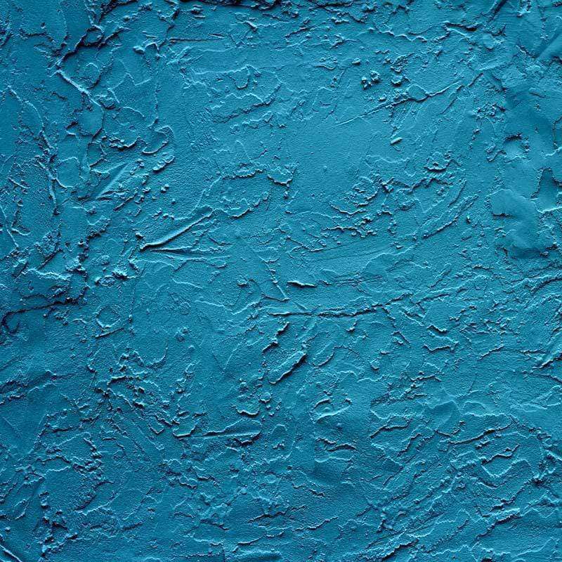 Textured teal blue pattern reminiscent of a cracked surface