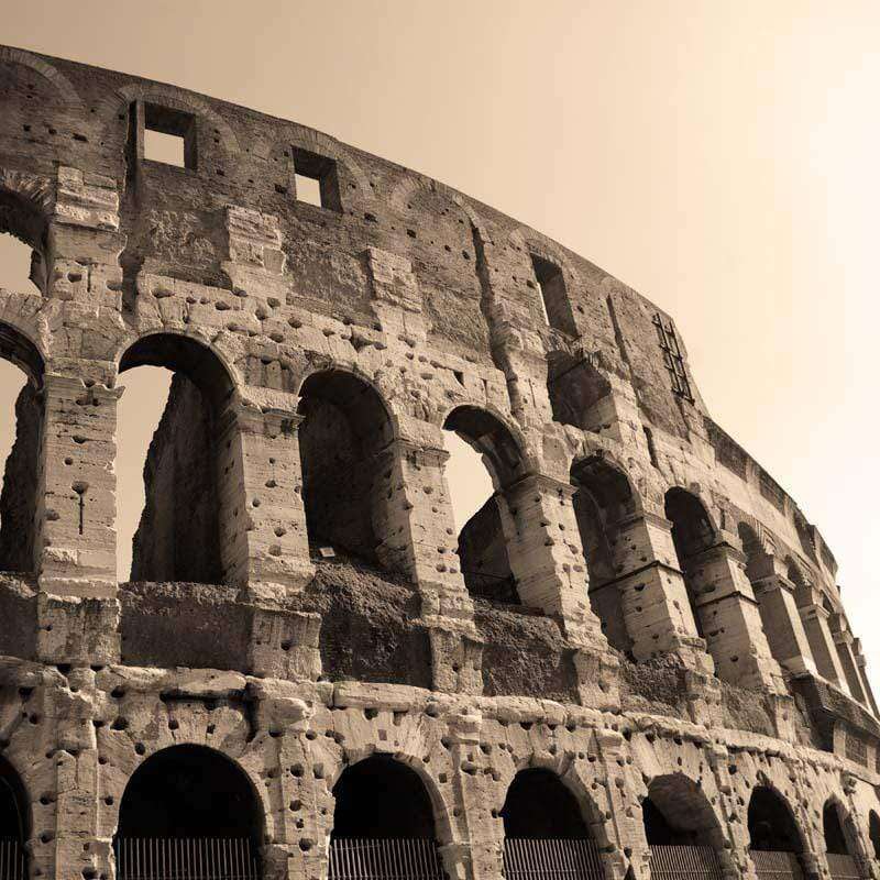 Sepia-tone image of Roman Colosseum ruins