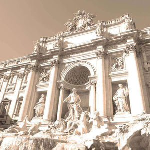 Sepia-toned image of baroque sculptures on a historical fountain facade