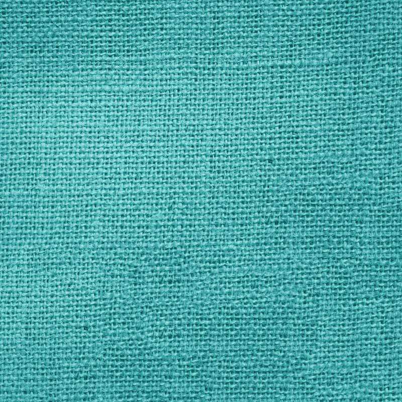 Teal textile closeup with woven pattern