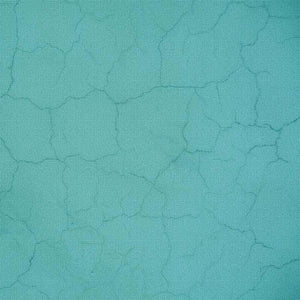 Abstract cracked pattern on a teal textured background