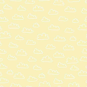 Seamless pattern with white cloud outlines on a pastel yellow background