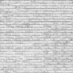 Black and white image of a brick wall pattern