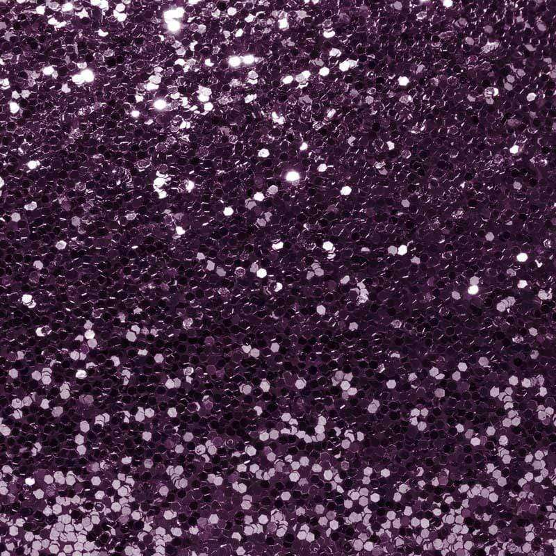 Glittery purple textured pattern with specks of light