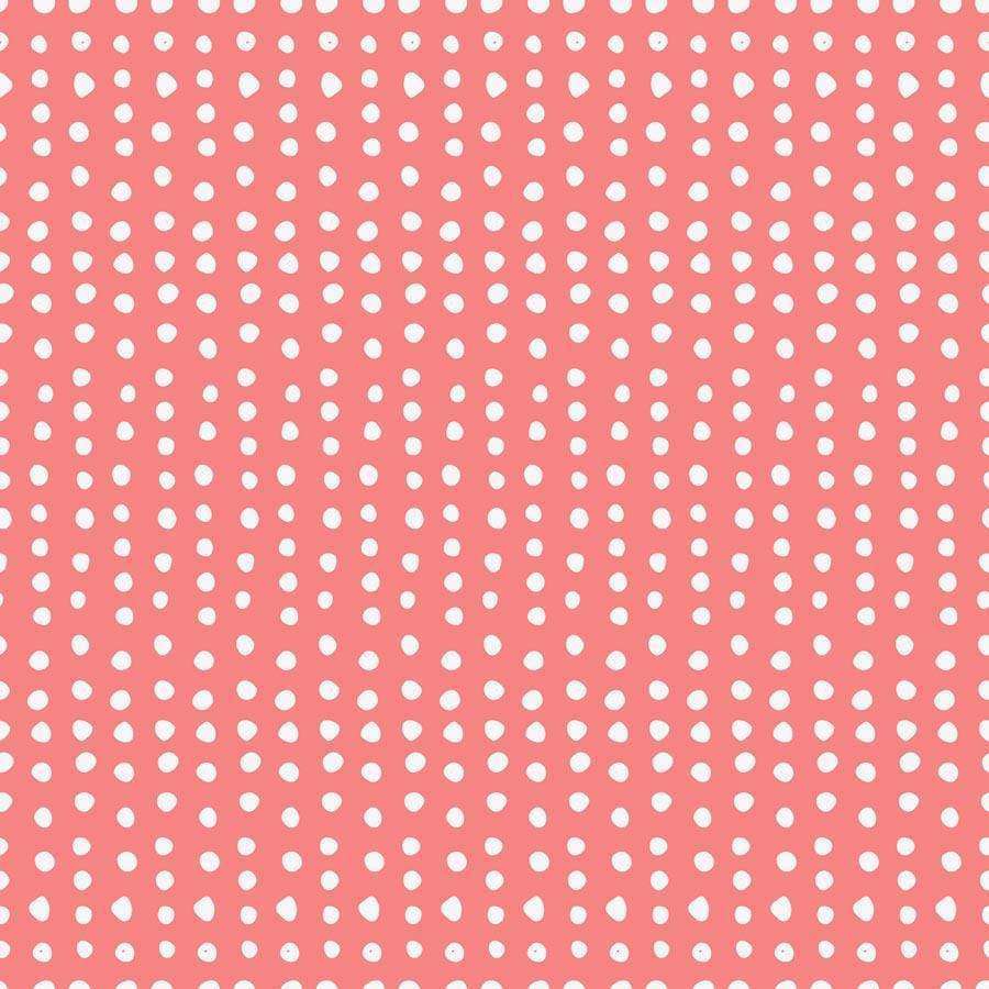Coral background with white polka dots
