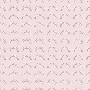 Pastel pink background with stylized sunburst patterns