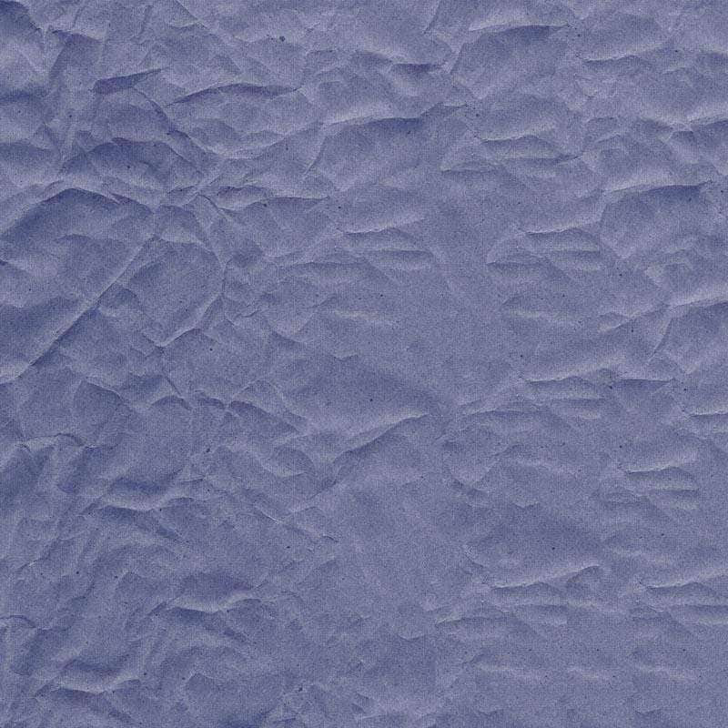 Texture of crinkled paper in various shades of purple