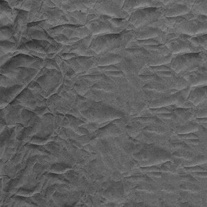 Crumpled texture pattern in grayscale