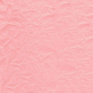Soft pink crumpled paper texture