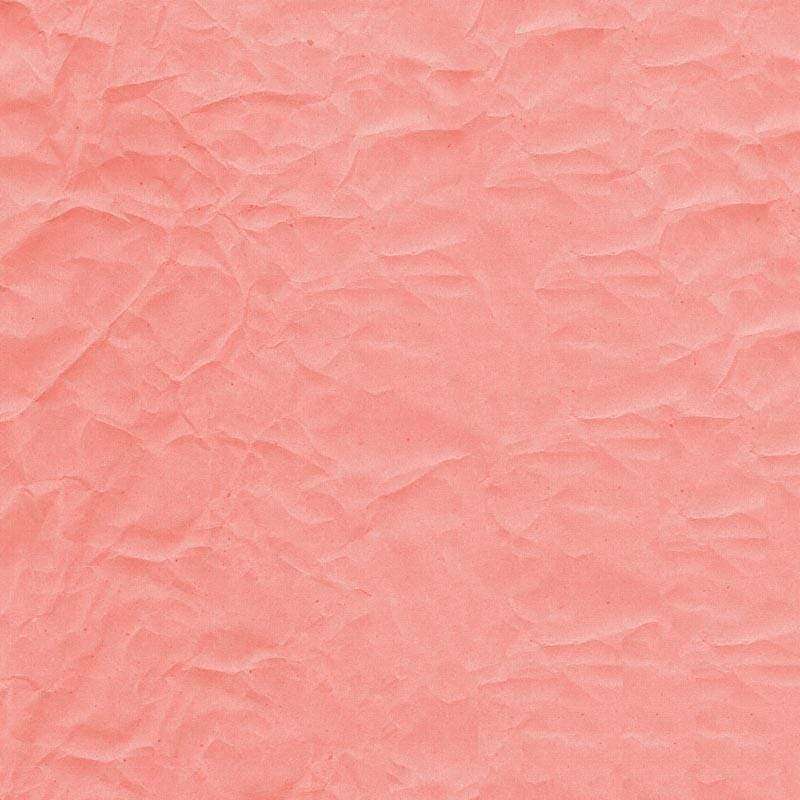 Crumpled paper texture in soft pink