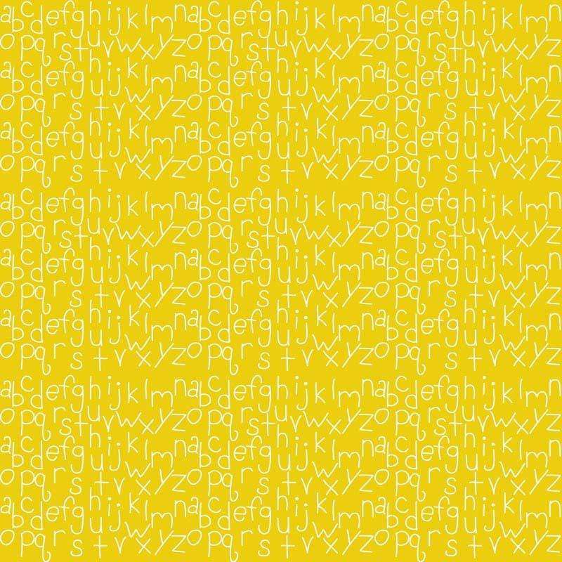 Alphabet letters scattered on a mustard yellow background