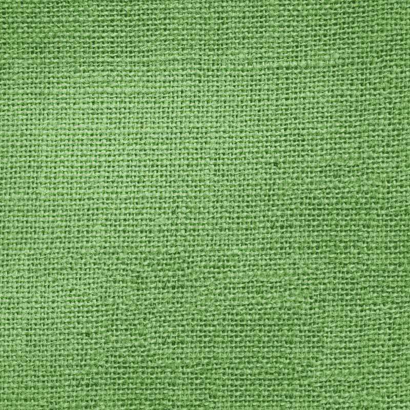 Close-up of a green textured fabric pattern