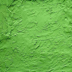 Textured green stucco wall pattern