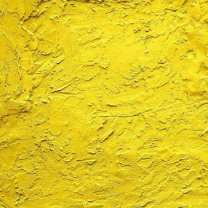 Textured yellow stucco pattern