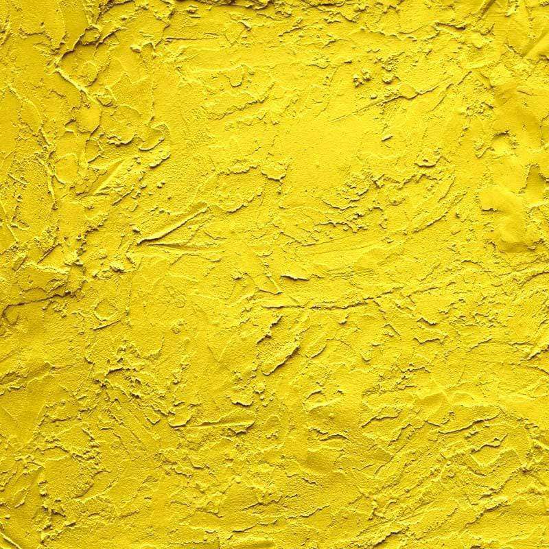 Textured yellow stucco pattern